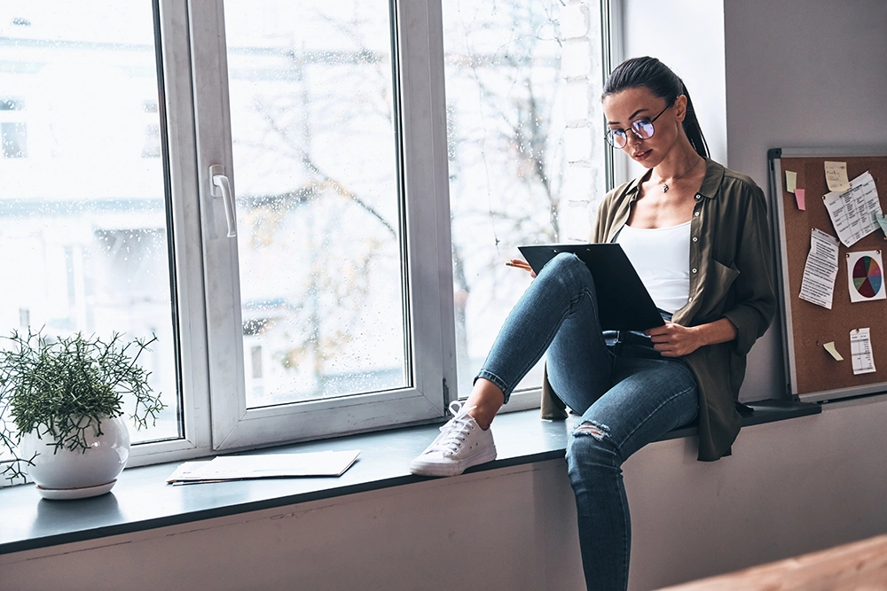 Woman planning out her next steps in marketing and SEO