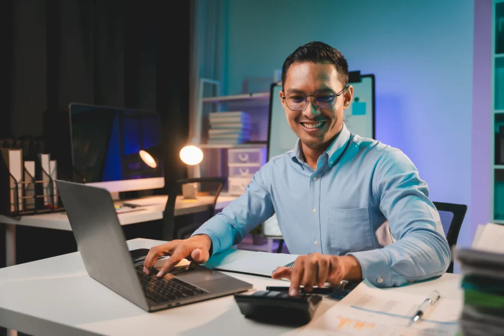 Focused technical SEO analyst working on website performance metrics late at night.