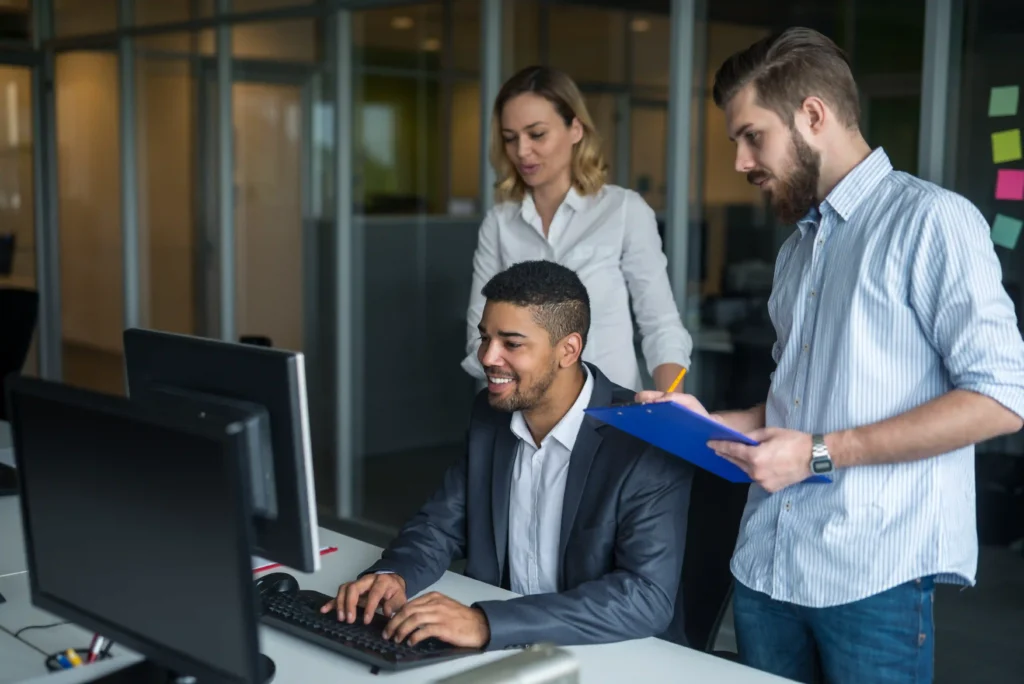 Technical SEO analyst collaborating with marketing and development teams on optimization strategies.