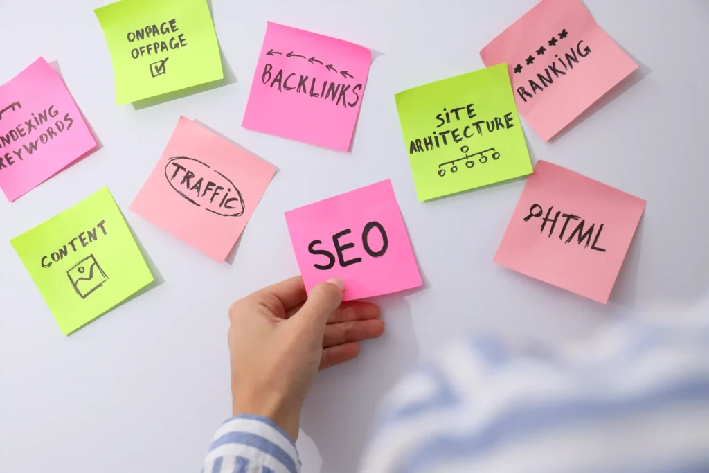 Technical SEO executive planning website optimization with sticky notes for keywords, traffic, and site architecture