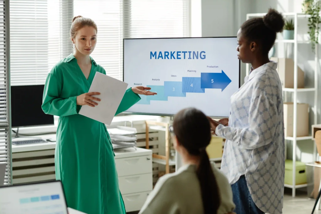 Marketing professional presenting Off-Page SEO planning strategy to a team