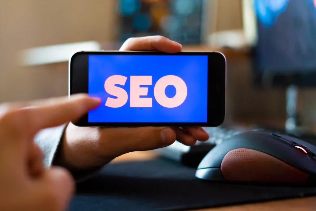 Mobile screen displaying SEO text, emphasizing mobile optimization for on page SEO for website