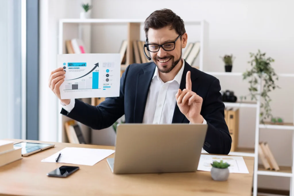 Confident business professional presenting SEO performance chart during online meeting