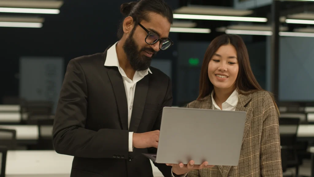 Global SEO manager collaborating with international team members in modern office