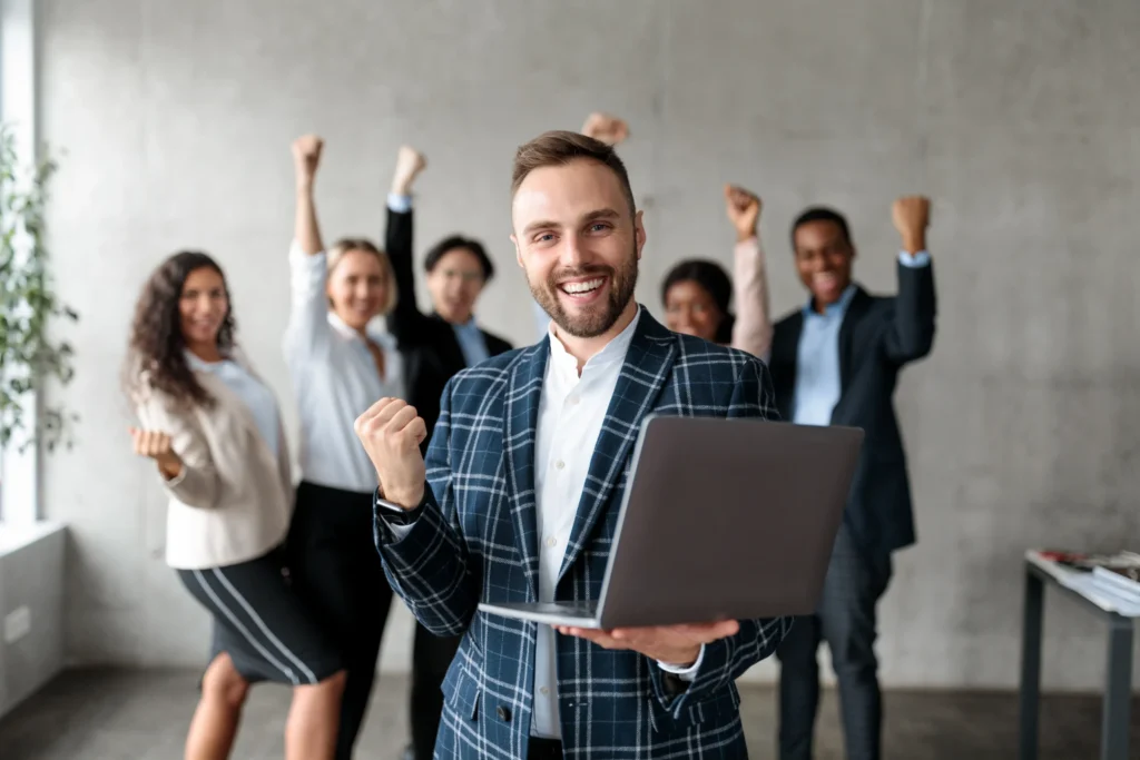 Successful SEO link building specialist celebrating team achievement with backlinks campaign