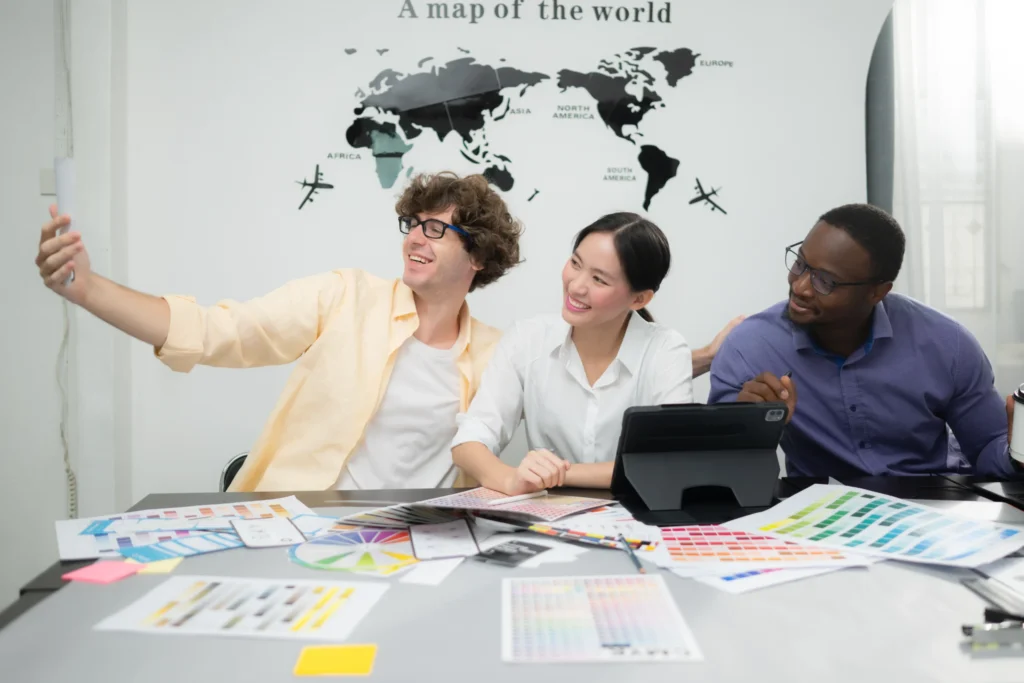 Multinational design team working together on a global SEO services campaign