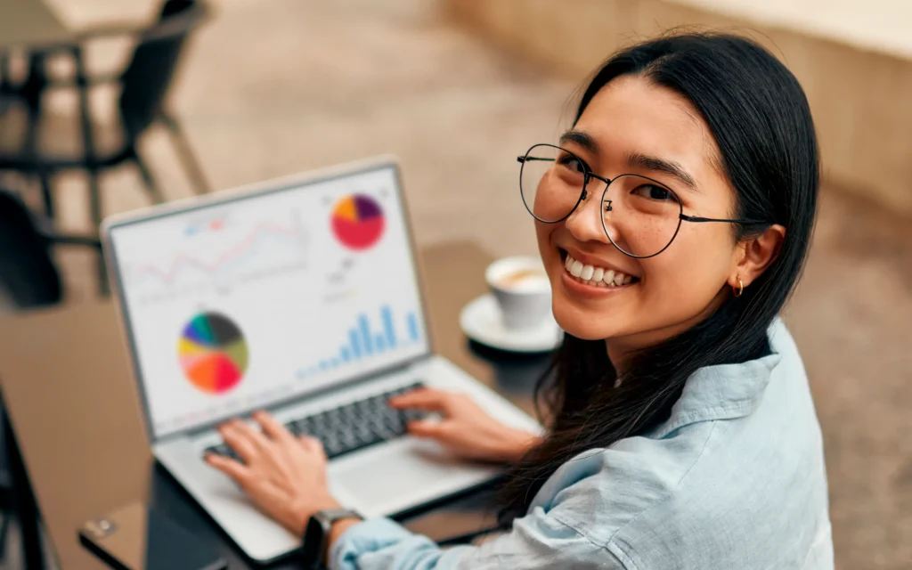 Digital marketer analyzing data on laptop for SEO work plan success