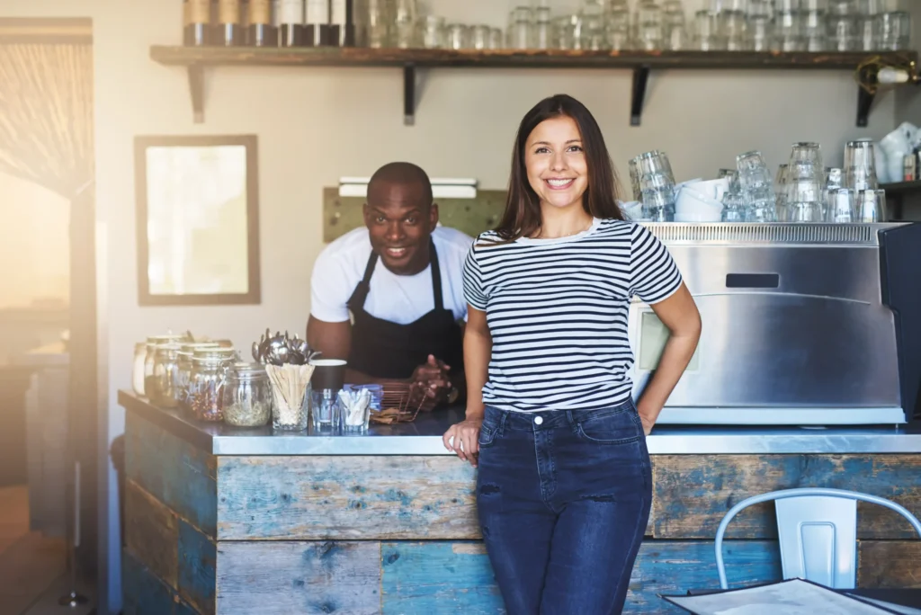 Small café owners supported by the best local SEO company in the nation, boosting local visibility and foot traffic.
