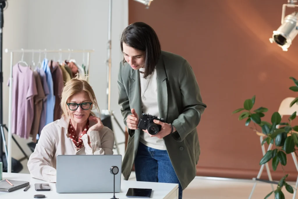 Local search experts strategizing digital visibility for creative businesses in an office setting.