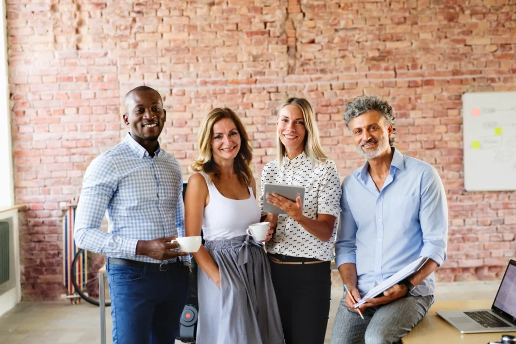 Diverse digital marketing group discussing strategies for online reputation management in digital marketing performance growth.
