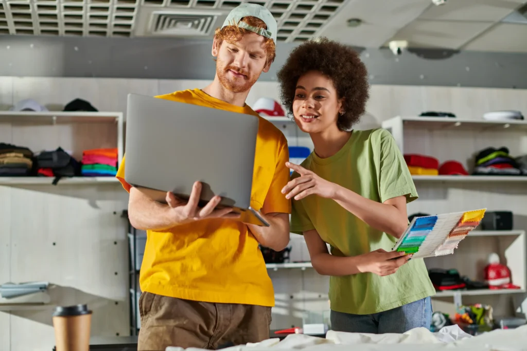Small business owner collaborating with one of the top ecommerce marketing agencies to grow online sales.