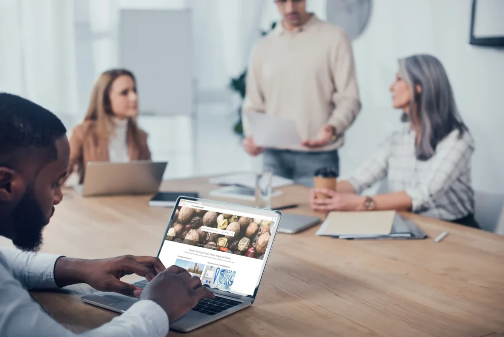 Digital agency website planning session with a marketing team collaborating on strategy, design, and content decisions