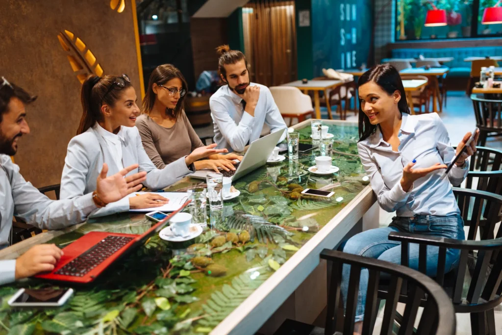 Restaurant marketing firms meeting with restaurant owners to plan marketing campaigns and revenue growth