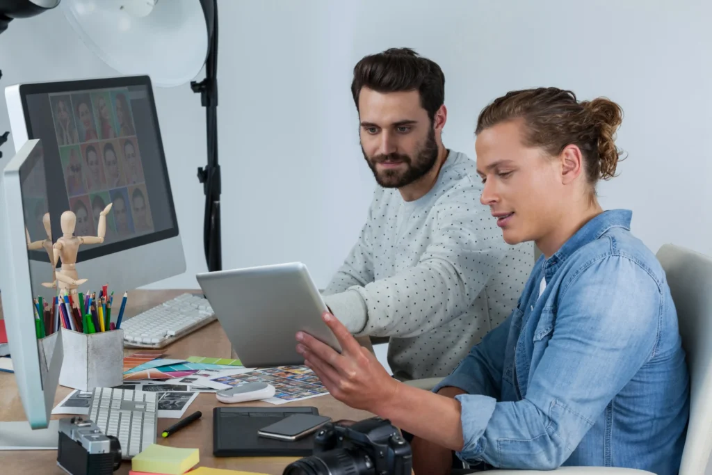 Digital creative agency team collaborating on content creation, photography, and brand visuals for a cohesive marketing strategy